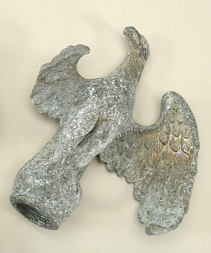  Scorched eagle finial from an office flagpole, recovered from the wreckage at the Pentagon.