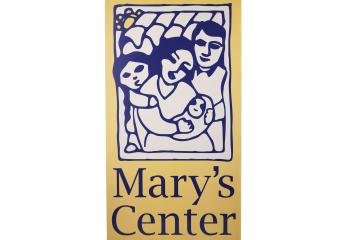 Sign with an illustration of a family and the text "Mary's Center"
